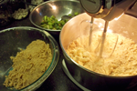 mixing cake batter for rhubarb crumb cake
