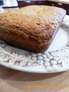 vegan banana bread loaf on white plate