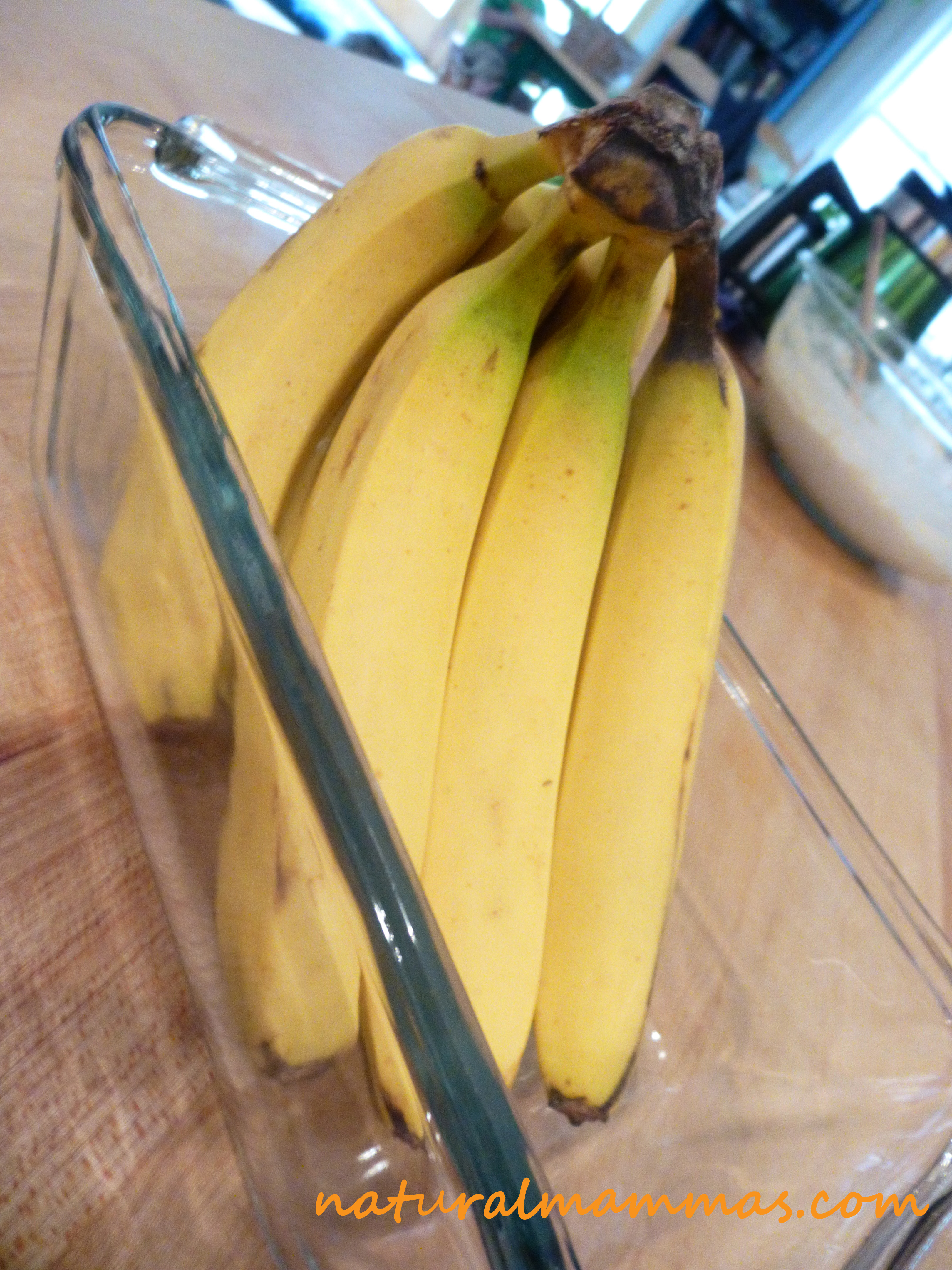 organic bananas in glass bread baking dish